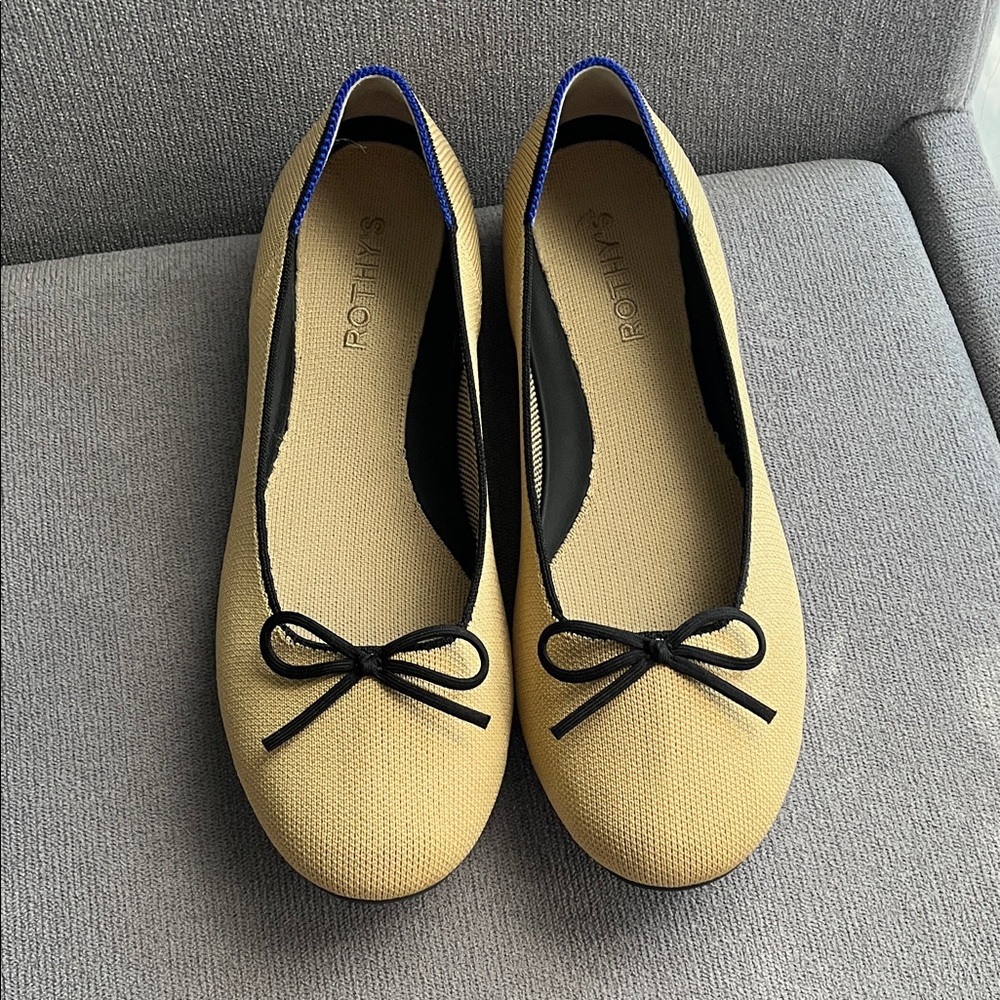 Rothy's Yellow Ballet Flats with Black Trim and Bow